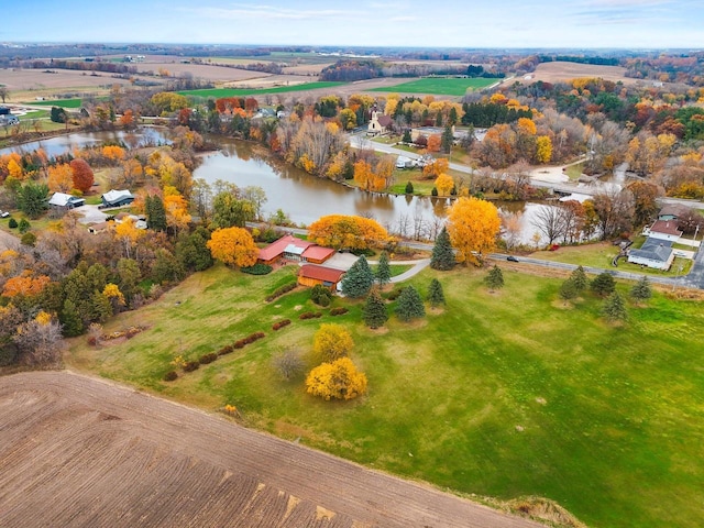 drone / aerial view featuring a rural view and a water view