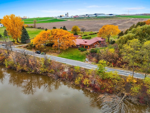 bird's eye view with a water view and a rural view