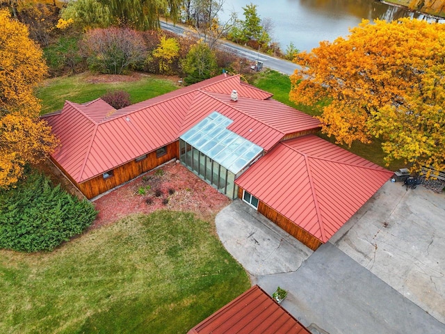 drone / aerial view with a water view