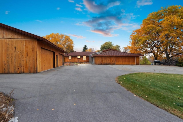 view of front of house with a front yard and a garage