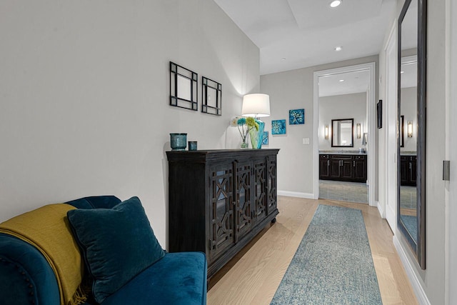 corridor featuring light hardwood / wood-style flooring