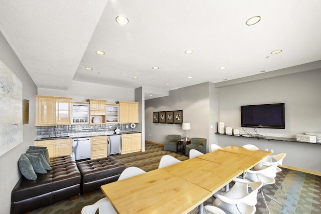 living room featuring dark hardwood / wood-style floors and sink