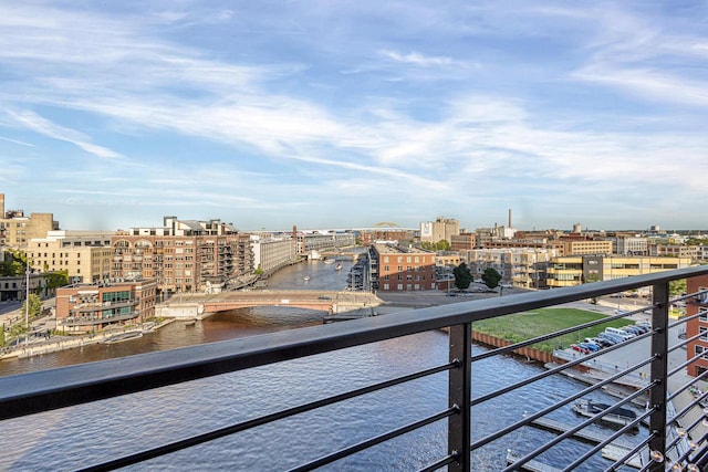 balcony featuring a water view