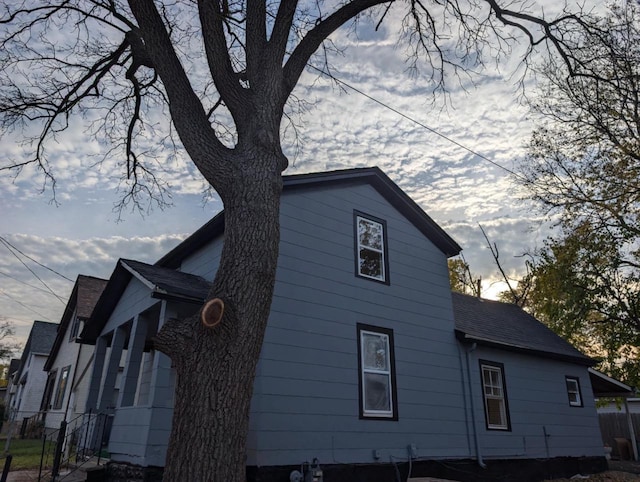 view of property exterior at dusk