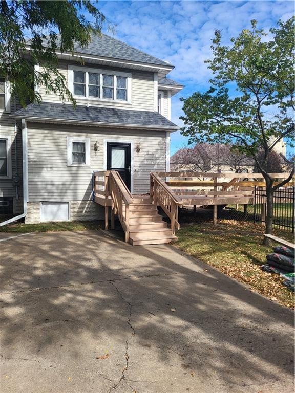 rear view of house with a deck