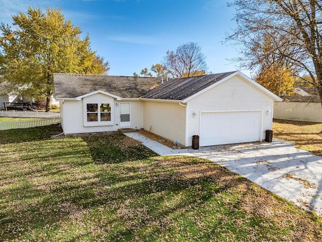 single story home featuring a front yard and a garage