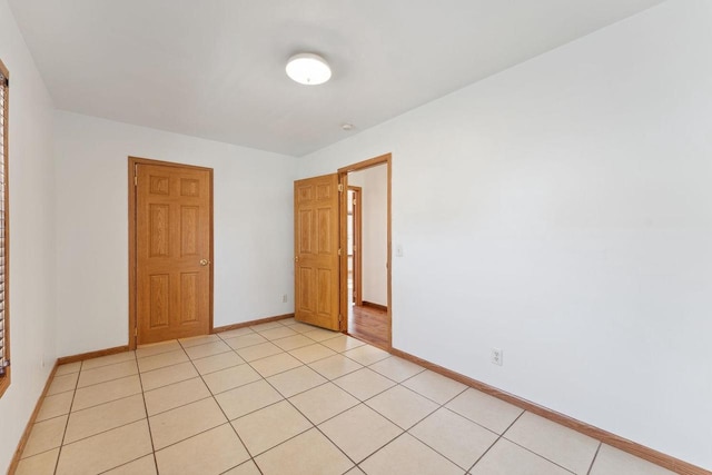 view of tiled spare room