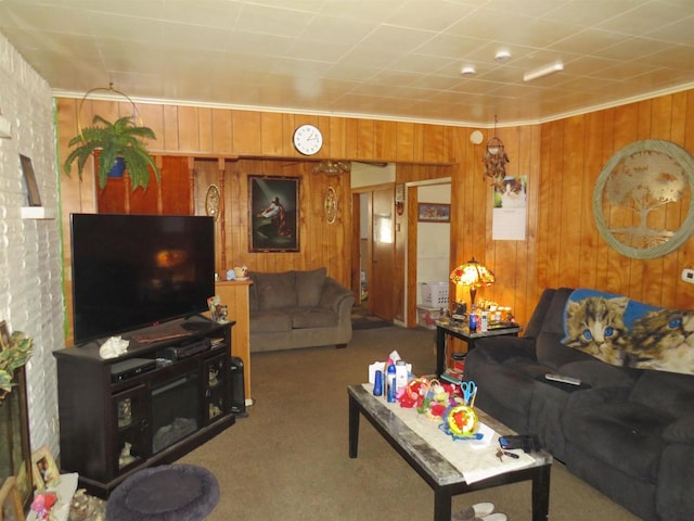 living room featuring wooden walls, light carpet, and crown molding