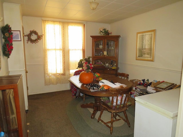 view of carpeted dining area