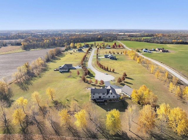 birds eye view of property featuring a rural view