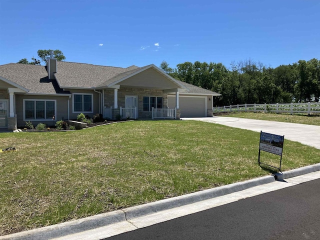 ranch-style house with a front lawn and a garage