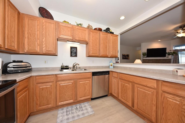 kitchen with sink, light hardwood / wood-style floors, dishwasher, and ceiling fan