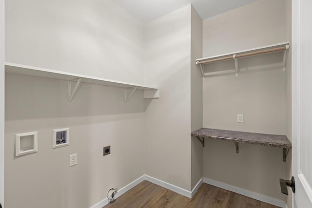 clothes washing area featuring hookup for an electric dryer, hookup for a washing machine, and dark hardwood / wood-style floors