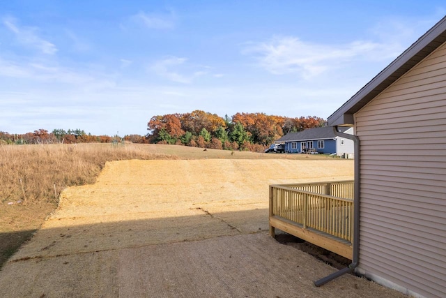 view of yard with a wooden deck