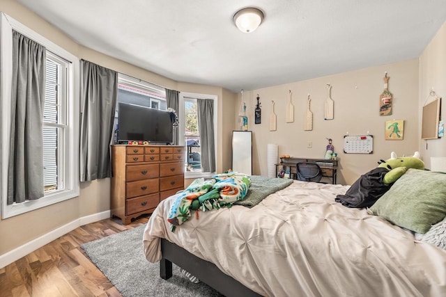 bedroom featuring light wood-type flooring