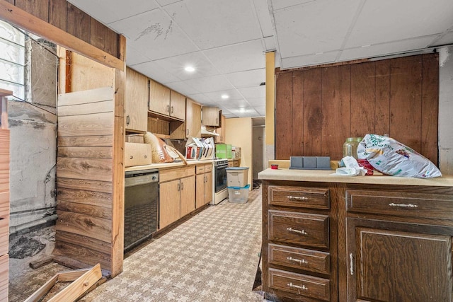 kitchen featuring black dishwasher, exhaust hood, a drop ceiling, and white gas range oven