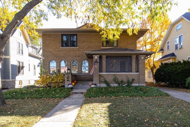 view of front of property with a front lawn