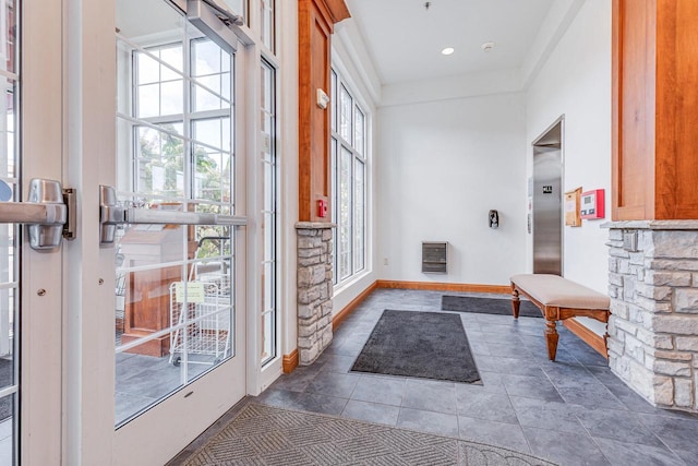 doorway to outside featuring a wealth of natural light