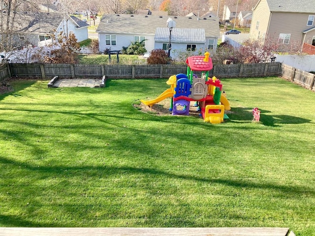 view of jungle gym featuring a yard