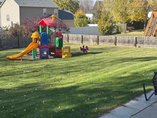 view of play area featuring a yard