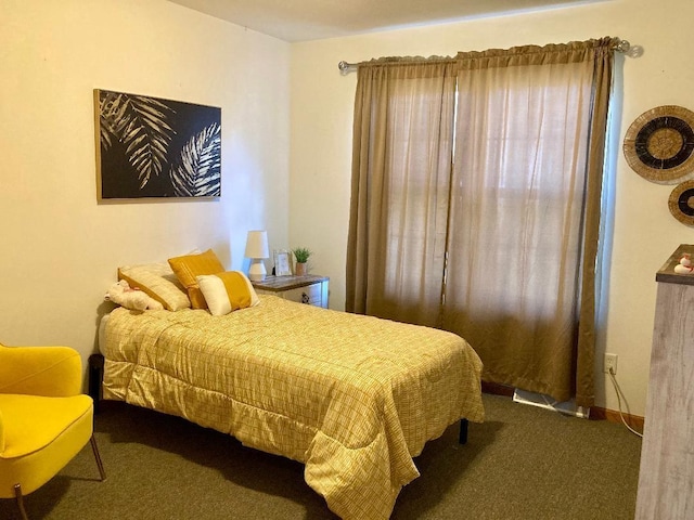 bedroom featuring carpet