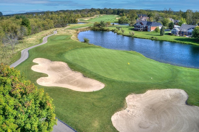 surrounding community with a water view