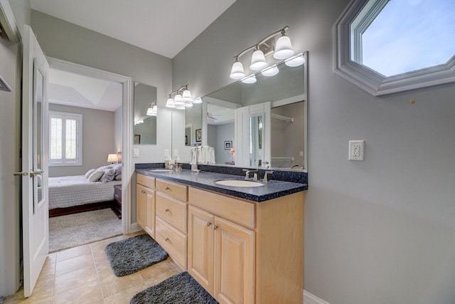 bathroom with vanity and tile patterned floors