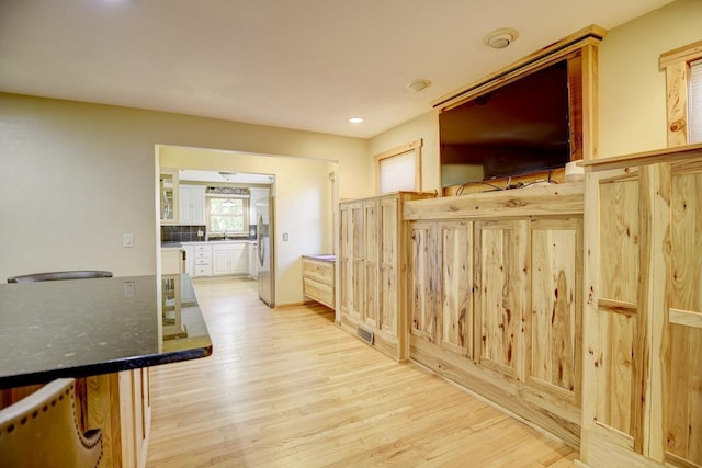 interior space with light hardwood / wood-style floors