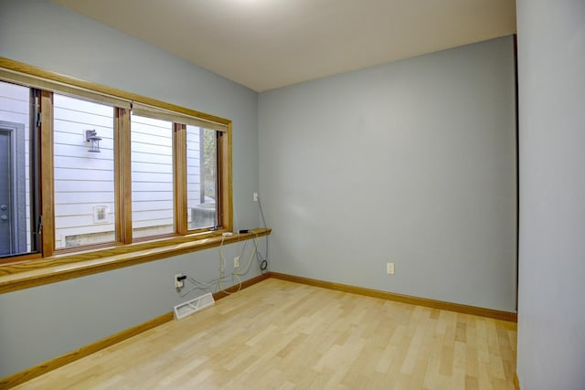 empty room featuring light hardwood / wood-style floors