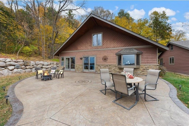 rear view of house with a patio