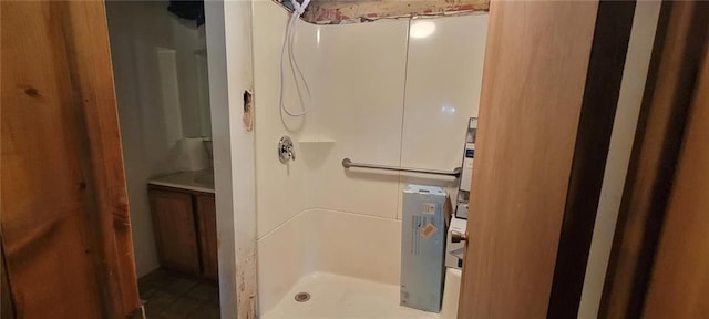 bathroom featuring a stall shower