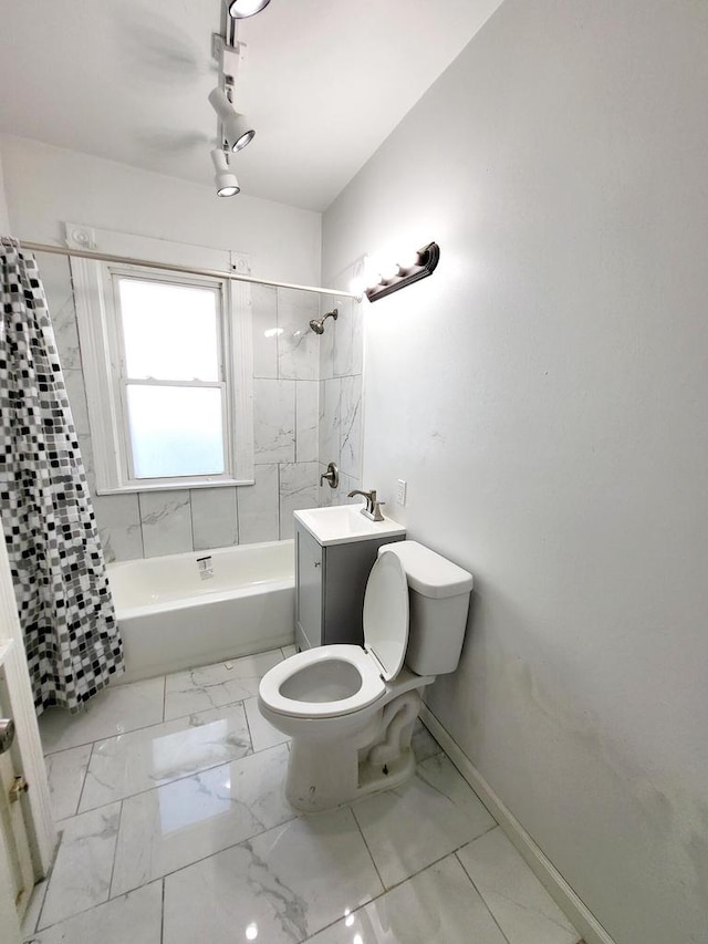 full bathroom with vanity, toilet, and shower / bath combo