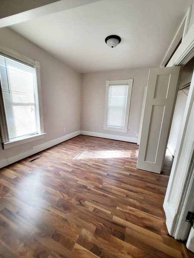 interior space featuring dark hardwood / wood-style flooring