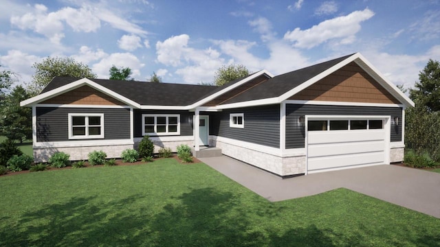 view of front of home with a front yard and a garage