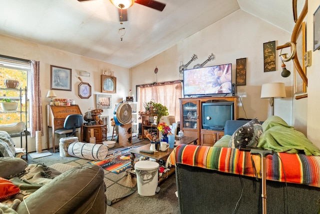 living room featuring lofted ceiling, carpet flooring, and ceiling fan