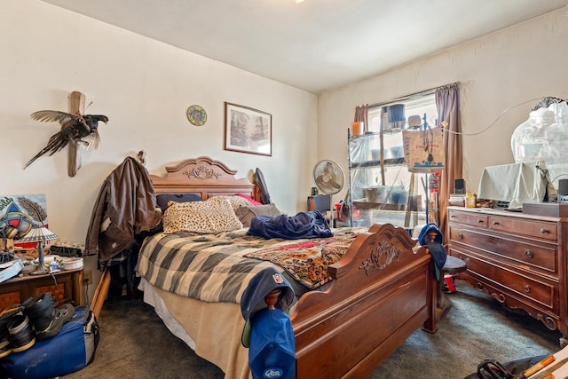 bedroom with dark carpet