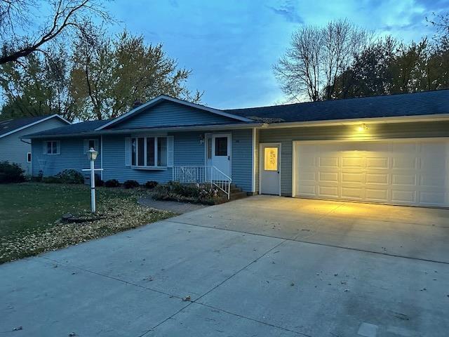 single story home with a garage