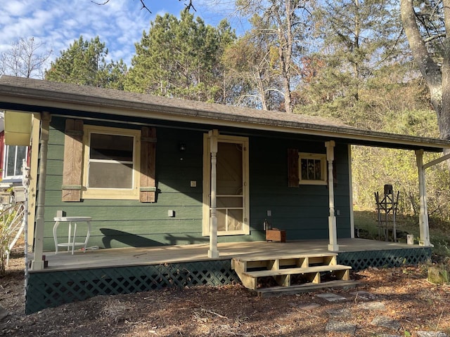 exterior space featuring a wooden deck