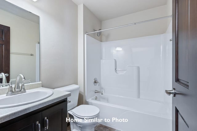 full bathroom featuring vanity, shower / washtub combination, and toilet