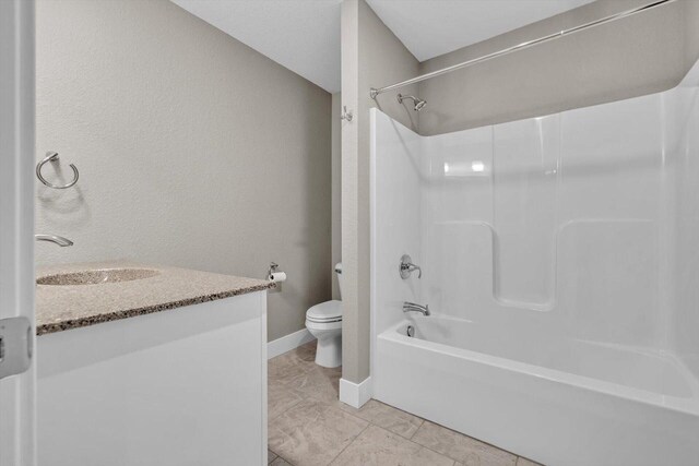 full bathroom with vanity, shower / tub combination, toilet, and tile patterned floors