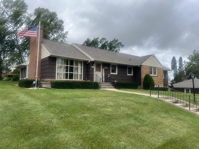 ranch-style house with a front lawn