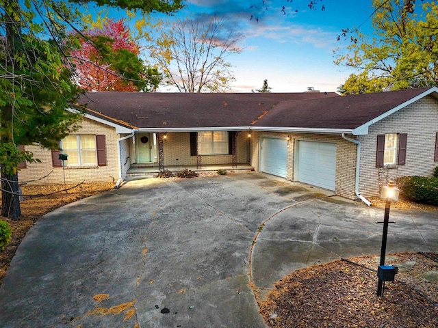 single story home featuring a garage