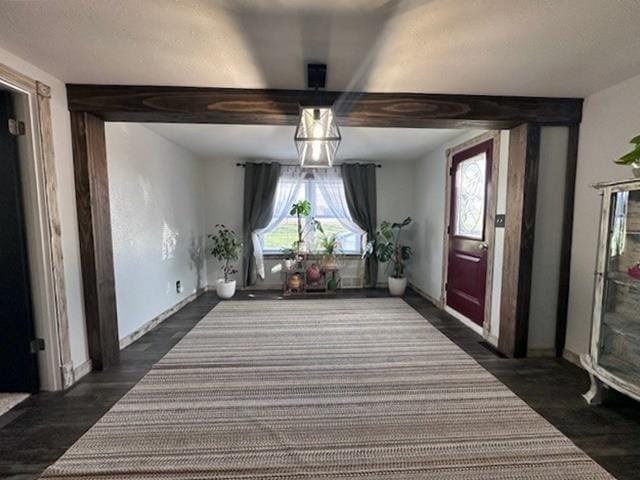 dining area featuring dark wood-type flooring