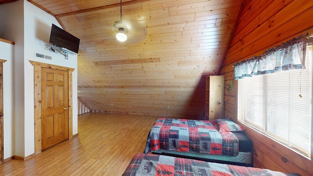331 Hilltop Ct, Warrens, Warrens, WI 54666 - bedroom featuring vaulted ceiling, wooden walls, wood ceiling, and light wood finished floors