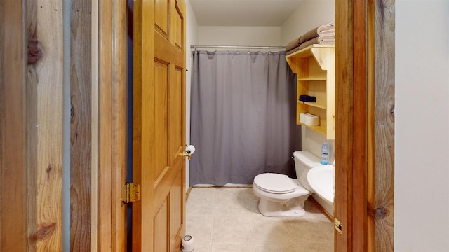 331 Hilltop Ct, Warrens, Warrens, WI 54666 - bathroom featuring toilet, tile patterned flooring, and curtained shower