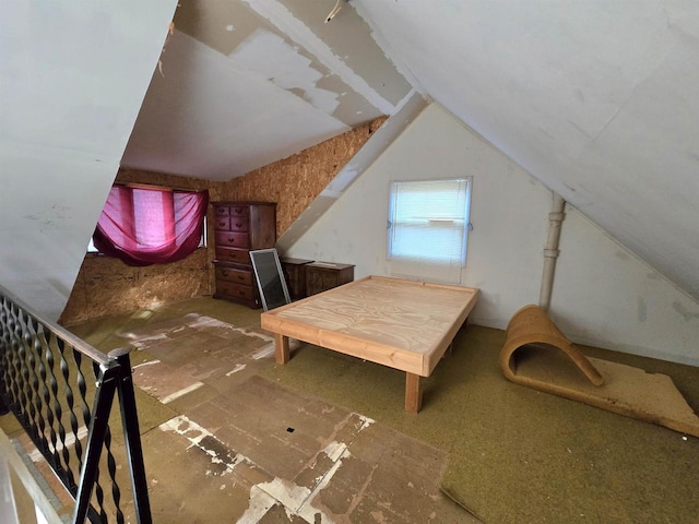 bonus room featuring vaulted ceiling