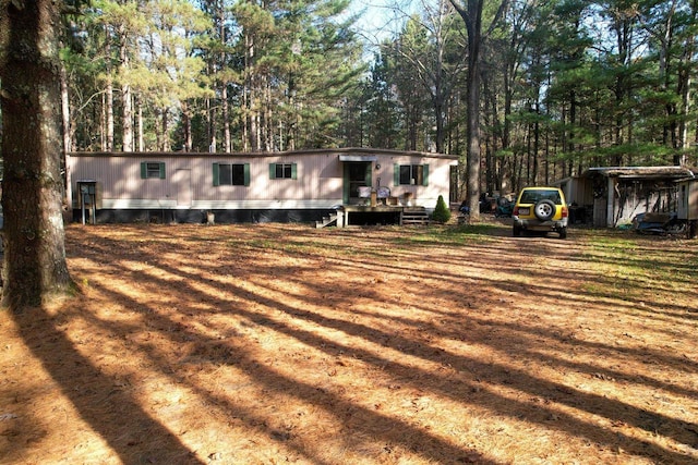 view of front of house with a carport