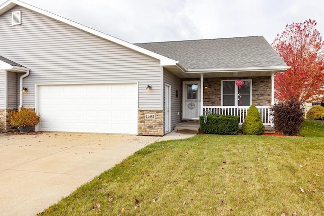 ranch-style home featuring a front lawn, a garage, and a porch