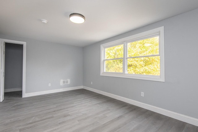 empty room featuring light hardwood / wood-style floors