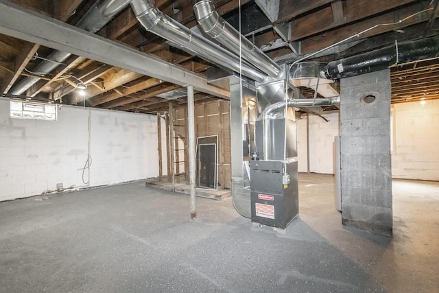 basement featuring heating unit